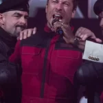 Glen Powell The Running Man 2025 Red Jacket