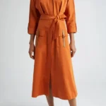 Wake Up Dead Man Kerry Washington Orange Coat front