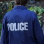 Tracker S03 Derek Richardson Blue Jacket back