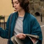 A Good Girl’s Guide to Murder Emma Myers Blue Bomber Jacket