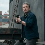 The Night Agent Adam Blue Vest